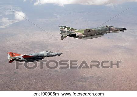 Two QF-4E Phantom II drones in formation over the New Mexico desert. View Large Photo Image Picture - Two QF-4E Phantom II drones in formation over the New Mexico desert.. Fotosearch