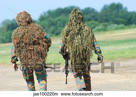 Two snipers of the Belgian Army dressed in ghillie suits. View Large Photo Image Picture - Two snipers of the Belgian Army dressed in ghillie suits.. Fotosearch