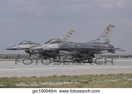 Two Turkish Air Force F-16C aircraft ready for take-off. View Large Photo Image Picture - Two Turkish Air Force F-16C aircraft ready for take-off.. Fotosearch