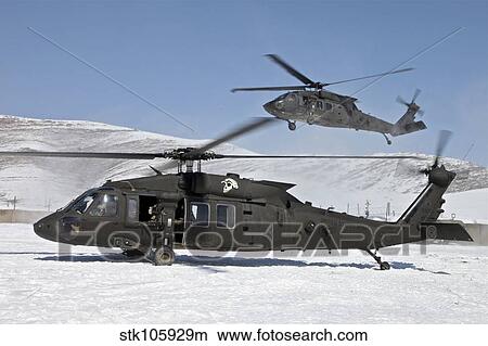 Two U. S. Army UH-60 Black Hawk helicopters. View Large Photo Image Picture - Two U. S. Army UH-60 Black Hawk helicopters.. Fotosearch