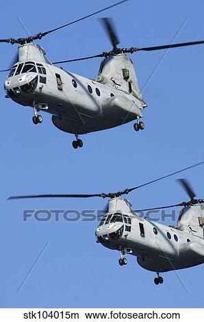 Two U. S. Marine Corps CH-46E Sea Knight helicopters in flight. View Large Photo Image Picture - Two U. S. Marine Corps CH-46E Sea Knight helicopters in flight.. Fotosearch