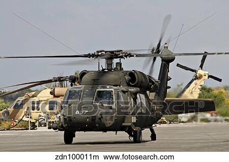 Two UH-60L Yanshuf helicopters of the Israeli Air Force. View Large Photo Image Picture - Two UH-60L Yanshuf helicopters of the Israeli Air Force.. Fotosearch