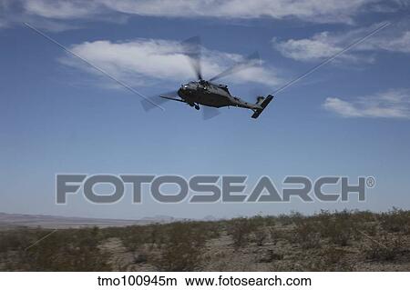 U. S. Air Foce HH-60G Pave Hawk in flight over Arizona. View Large Photo Image Picture - U. S. Air Foce HH-60G Pave Hawk in flight over Arizona.. Fotosearch