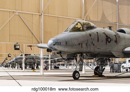 U. S. Air Force A-10 Thunderbolt II aircraft sit in the sun shelters. View Large Photo Image Picture - U. S. Air Force A-10 Thunderbolt II aircraft sit in the sun shelters.. Fotosearch