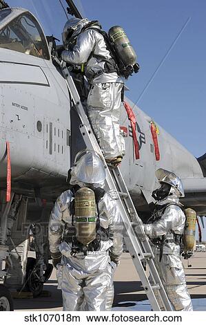 Picture - U. S. Air Force Airmen perform a rescue scenario.. Fotosearch