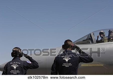 U. S. Air Force Airmen salute the Captain of an aircraft. View Large Photo Image Picture - U. S. Air Force Airmen salute the Captain of an aircraft.. Fotosearch