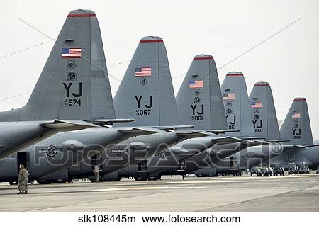 U. S. Air Force C-130 Hercules aircraft on the flight line at Yokota Air Base. View Large Photo Image Picture - U. S. Air Force C-130 Hercules aircraft on the flight line at Yokota Air Base.. Fotosearch