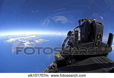 U. S. Air Force captain looks out over the sky in a F-15 Eagle. View Large Photo Image Picture - U. S. Air Force captain looks out over the sky in a F-15 Eagle.. Fotosearch