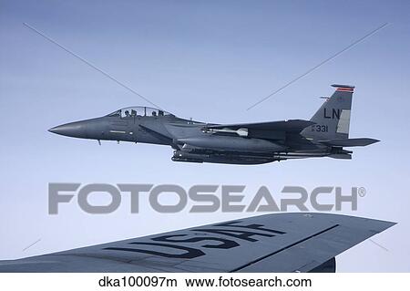 U. S. Air Force F-15E Strike Eagle over the wing of a KC-135 Stratotanker. View Large Photo Image Picture - U. S. Air Force F-15E Strike Eagle over the wing of a KC-135 Stratotanker.. Fotosearch