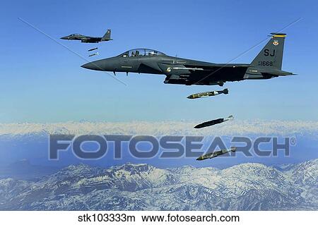 Picture - U. S. Air Force F-15E Strike Eagle aircraft drops 2, 000-pound joint direct attack munitions.. Fotosearch