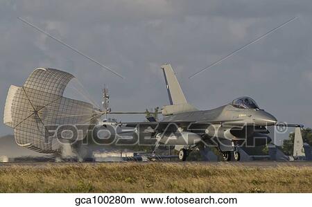 U. S. Air Force F-16 Fighting Falcon with drag chute deployed. View Large Photo Image Picture - U. S. Air Force F-16 Fighting Falcon with drag chute deployed.. Fotosearch