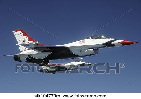 U. S. Air Force F-16 Thunderbirds during an air-to-air refueling mission. View Large Photo Image Picture - U. S. Air Force F-16 Thunderbirds during an air-to-air refueling mission.. Fotosearch