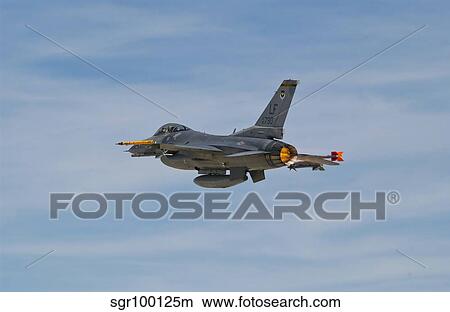 Picture - U. S. Air Force F-16C Fighting Falcon in flight over Nevada.. Fotosearch