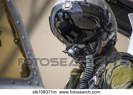 U. S. Air Force pilot conducts preflight checks on his aircraft. View Large Photo Image Picture - U. S. Air Force pilot conducts preflight checks on his aircraft.. Fotosearch