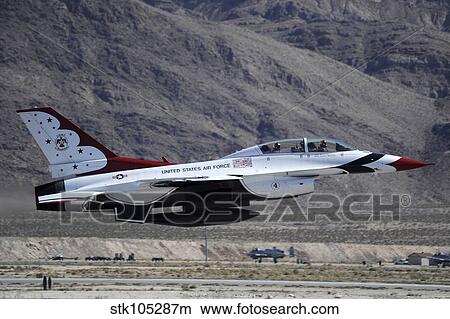 Picture - U. S. Air Force Thunderbird F-16 Fighting Falcon takes off.. Fotosearch