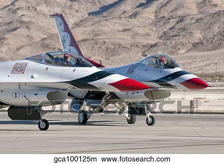 U. S. Air Force Thunderbirds on the ramp at Nellis Air Force Base, Nevada. View Large Photo Image Picture - U. S. Air Force Thunderbirds on the ramp at Nellis Air Force Base, Nevada.. Fotosearch