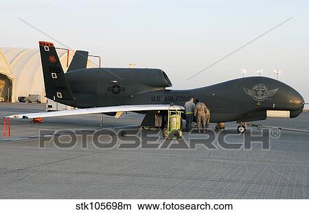 U. S. Airmen conduct preflight services on an RQ-4 Global Hawk. View Large Photo Image Picture - U. S. Airmen conduct preflight services on an RQ-4 Global Hawk.. Fotosearch