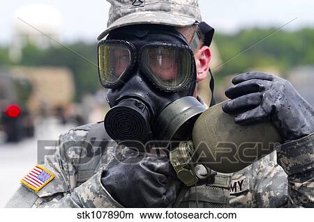 U. S. Army chemical operations specialist takes a break for water. View Large Photo Image Picture - U. S. Army chemical operations specialist takes a break for water.. Fotosearch