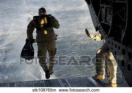 U. S. Army Green Beret exits a CH-47 Chinook helicopter. View Large Photo Image Picture - U. S. Army Green Beret exits a CH-47 Chinook helicopter.. Fotosearch