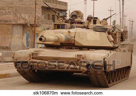 U. S. Army M1 Abrams tank conducts a combat patrol in Tall Afar, Iraq. View Large Photo Image Picture - U. S. Army M1 Abrams tank conducts a combat patrol in Tall Afar, Iraq.. Fotosearch