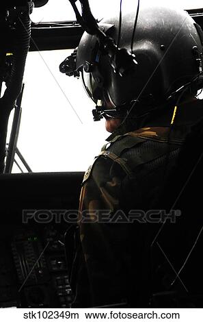 U. S. Army Officer speaks to a pilot aboard a UH-60A Black Hawk. View Large Photo Image Picture - U. S. Army Officer speaks to a pilot aboard a UH-60A Black Hawk.. Fotosearch
