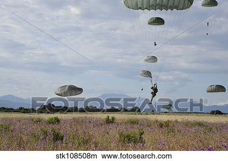 Picture - U. S. Army paratroopers descend to a drop zone in France.. Fotosearch