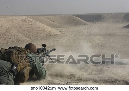 U. S. Army soldier fires a Barrett M82A1 rifle. View Large Photo Image Picture - U. S. Army soldier fires a Barrett M82A1 rifle.. Fotosearch