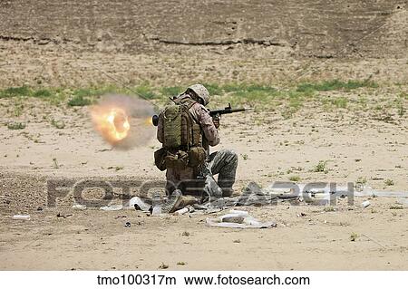 U. S. Army soldier fires a rocket-propelled grenade launcher. View Large Photo Image Picture - U. S. Army soldier fires a rocket-propelled grenade launcher.. Fotosearch