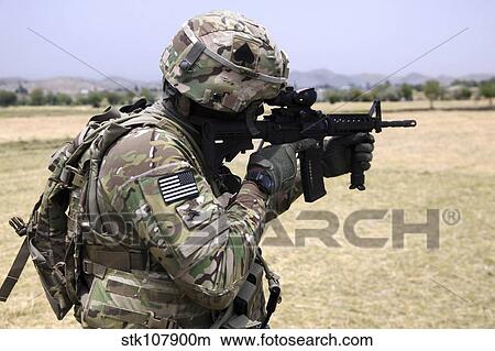 U. S. Army soldier pulls security in Khowst province, Afghanistan. View Large Photo Image Picture - U. S. Army soldier pulls security in Khowst province, Afghanistan.. Fotosearch
