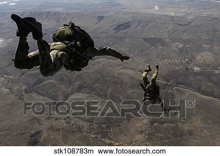 U. S. Army soldiers conduct a HALO jump over Washington. View Large Photo Image Picture - U. S. Army soldiers conduct a HALO jump over Washington.. Fotosearch
