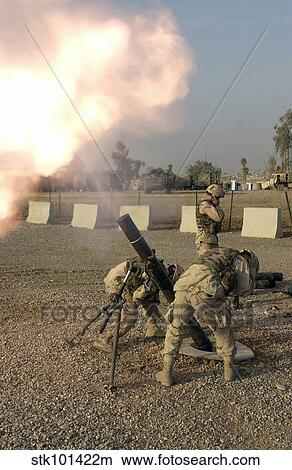 Picture - U. S. Army Soldiers fire a 120mm M120 Battalion Mortar.. Fotosearch