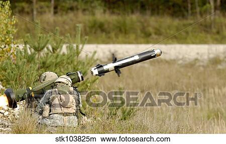 U. S. Army soldiers firing an FGM-148 Javelin anti-tank guided missile. View Large Photo Image Picture - U. S. Army soldiers firing an FGM-148 Javelin anti-tank guided missile.. Fotosearch