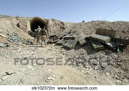 U. S. Army Soldiers inspect a weapons cache. View Large Photo Image Picture - U. S. Army Soldiers inspect a weapons cache.. Fotosearch