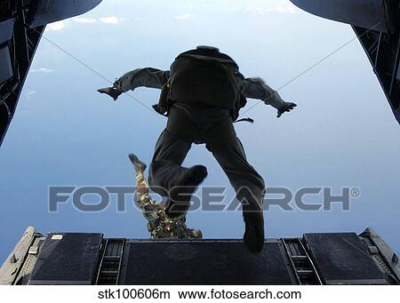 U. S. Army soldiers perform HALO jumps out of a CH-46E Sea Knight helicopter. View Large Photo Image Picture - U. S. Army soldiers perform HALO jumps out of a CH-46E Sea Knight helicopter.. Fotosearch