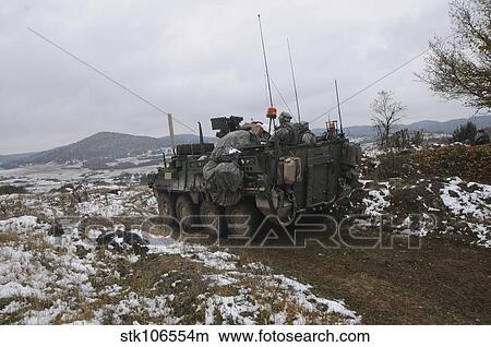 U. S. Army soldiers pull security in a Stryker armored vehicle. View Large Photo Image Picture - U. S. Army soldiers pull security in a Stryker armored vehicle.. Fotosearch