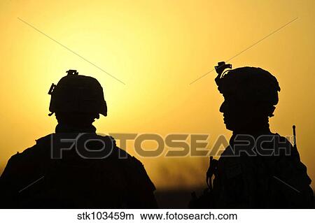 U. S. Army soldiers silhouetted against the morning sun in Afghanistan. View Large Photo Image Picture - U. S. Army soldiers silhouetted against the morning sun in Afghanistan.. Fotosearch