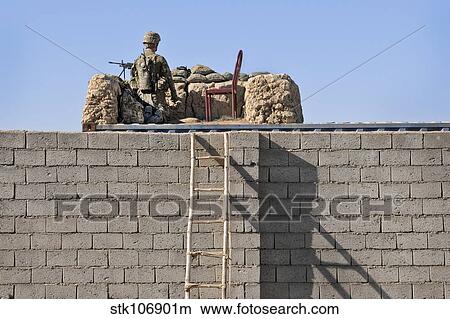 U. S. Army Specialist provides security overwatch in Afghanistan. View Large Photo Image Picture - U. S. Army Specialist provides security overwatch in Afghanistan.. Fotosearch