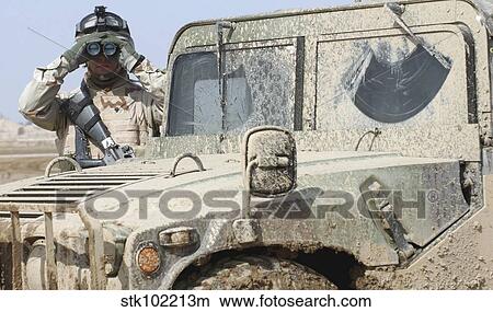 U. S. Army Specialist scans over the interior perimeter of Ali Air Base, Iraq. View Large Photo Image Picture - U. S. Army Specialist scans over the interior perimeter of Ali Air Base, Iraq.. Fotosearch