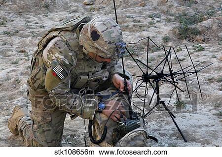 U. S. Army Specialist sets up radio communications. View Large Photo Image Picture - U. S. Army Specialist sets up radio communications.. Fotosearch