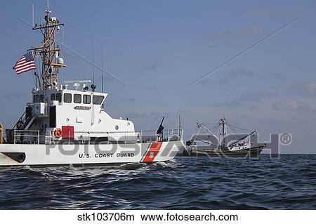 U. S. Coast Guard Cutter Marlin patrols the waters south of Pensacola Bay. View Large Photo Image Picture - U. S. Coast Guard Cutter Marlin patrols the waters south of Pensacola Bay.. Fotosearch