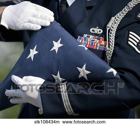 U. S. honor guard performs a flag folding demonstration. View Large Photo Image Picture - U. S. honor guard performs a flag folding demonstration.. Fotosearch