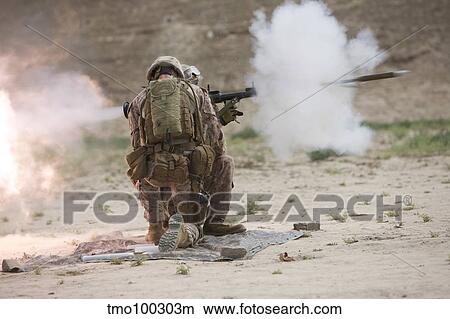 U. S. Marine fires a rocket-propelled grenade launcher. View Large Photo Image Picture - U. S. Marine fires a rocket-propelled grenade launcher.. Fotosearch