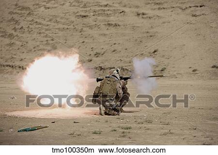 U. S. Marine fires a RPG-7 grenade launcher. View Large Photo Image Picture - U. S. Marine fires a RPG-7 grenade launcher.. Fotosearch