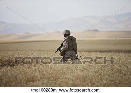 U. S. Marine patrols a wadi near Kunduz, Afghanistan. View Large Photo Image Picture - U. S. Marine patrols a wadi near Kunduz, Afghanistan.. Fotosearch