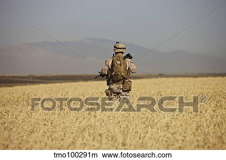U. S. Marine patrols a wadi near Kunduz, Afghanistan. View Large Photo Image Picture - U. S. Marine patrols a wadi near Kunduz, Afghanistan.. Fotosearch