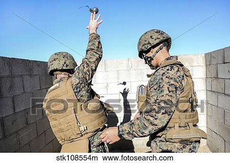 U. S. Marine practices throwing a training grenad. View Large Photo Image Picture - U. S. Marine practices throwing a training grenad.. Fotosearch
