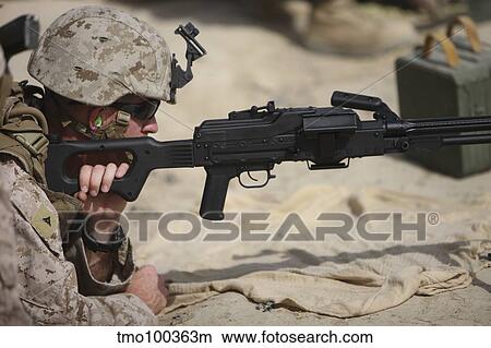 U. S. Marine prepares to fire a PK 7. 62mm machine gun. View Large Photo Image Picture - U. S. Marine prepares to fire a PK 7. 62mm machine gun.. Fotosearch
