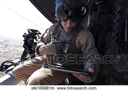 Picture - U. S. Marine provides close air support over Afghanistan.. Fotosearch