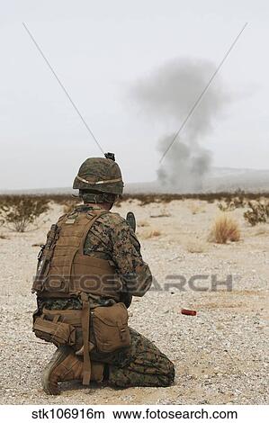 U. S. Marine provides security as part of a training assault. View Large Photo Image Picture - U. S. Marine provides security as part of a training assault.. Fotosearch