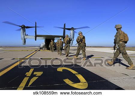 U. S. Marines and Sailors board an MV-22B Osprey. View Large Photo Image Picture - U. S. Marines and Sailors board an MV-22B Osprey.. Fotosearch